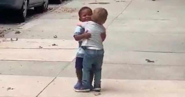 Maxwell and Finnegan in a tight hug in New York.